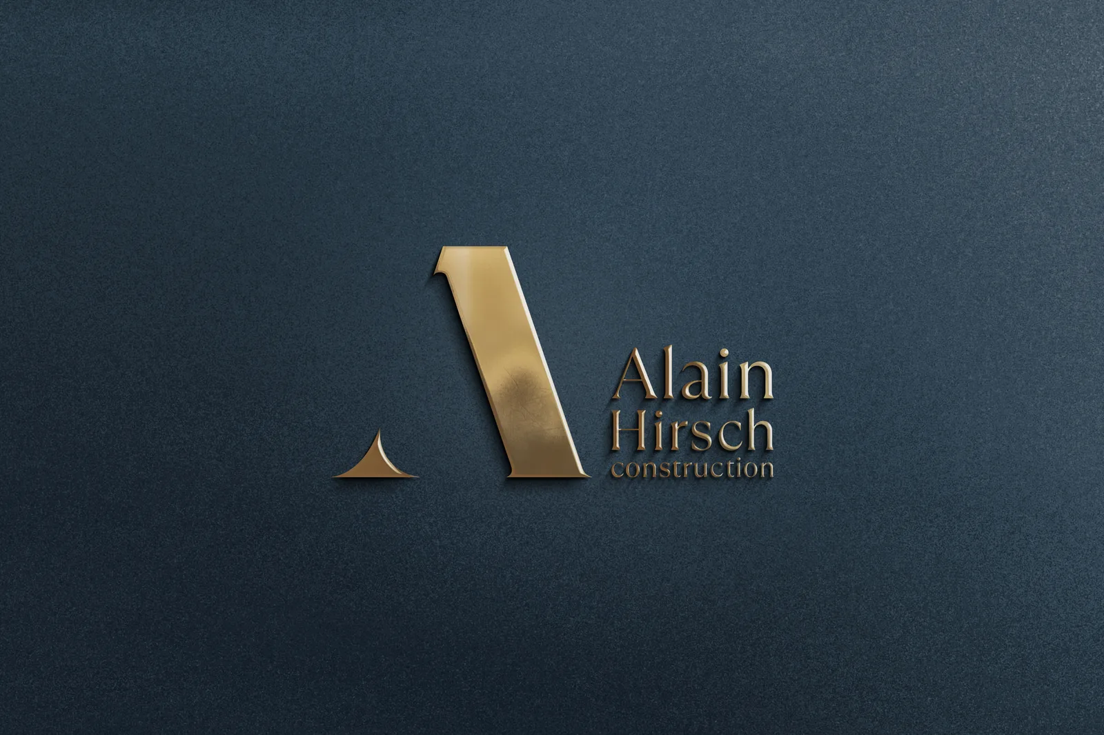 Gold embossed Alain Hirsch logo on navy