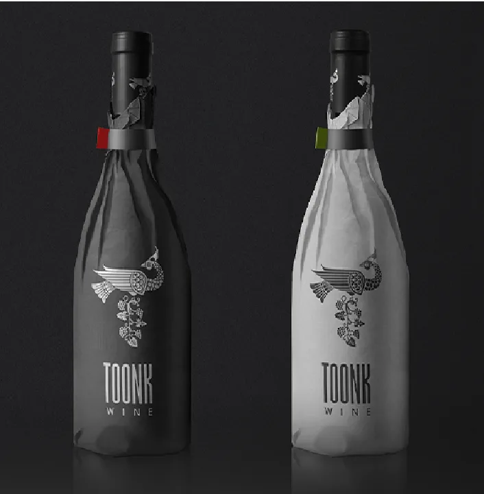 Two paper-wrapped Toonk Wine bottles
