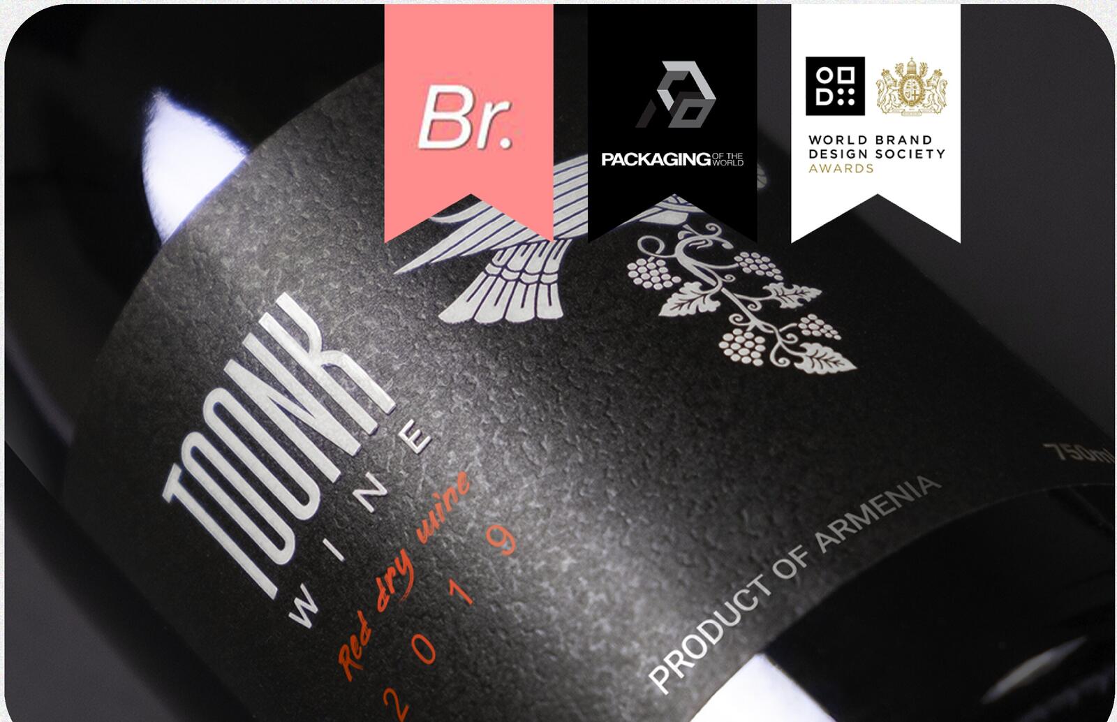 Toonk Wine label close-up with Packaging of the World and World Brand Design Society badges